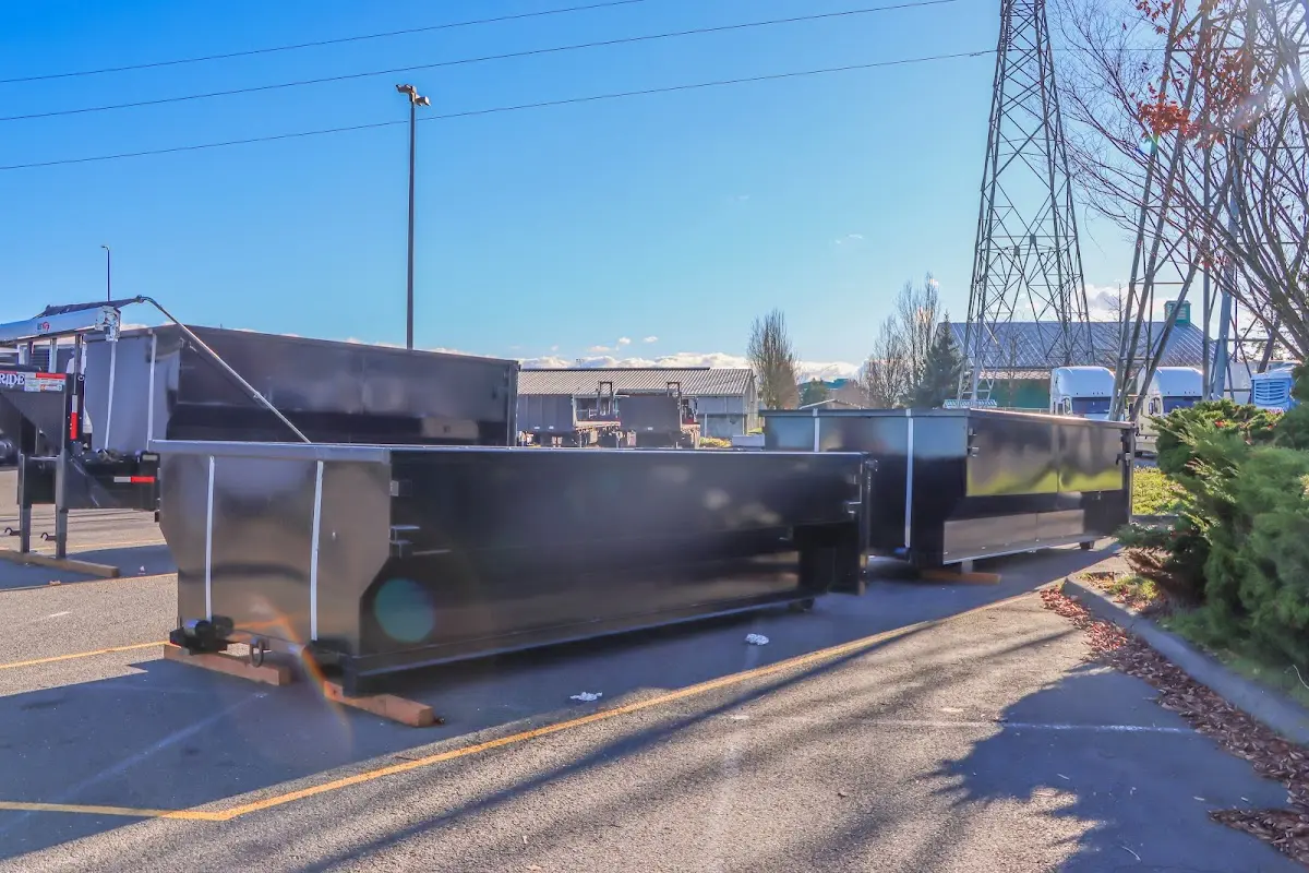 Roll-off dumpster ready for waste disposal at job site for Estate Cleanout Dumpster Rental in Cave Springs